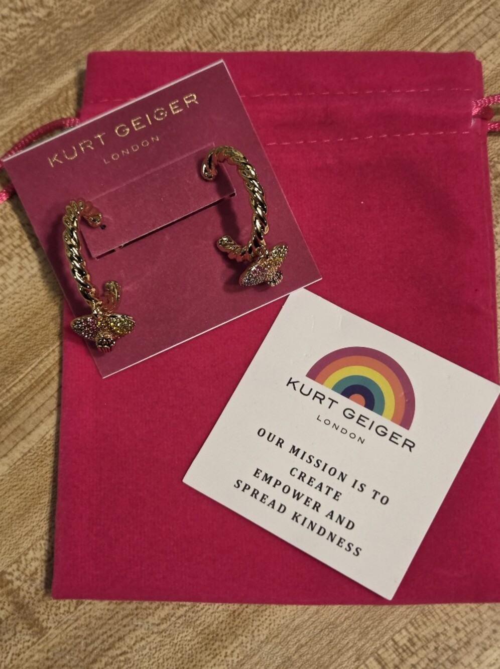 Kurt Geiger NWT Gold Tone Twisted Hoop Eagle medallion earrings w Pink Accents